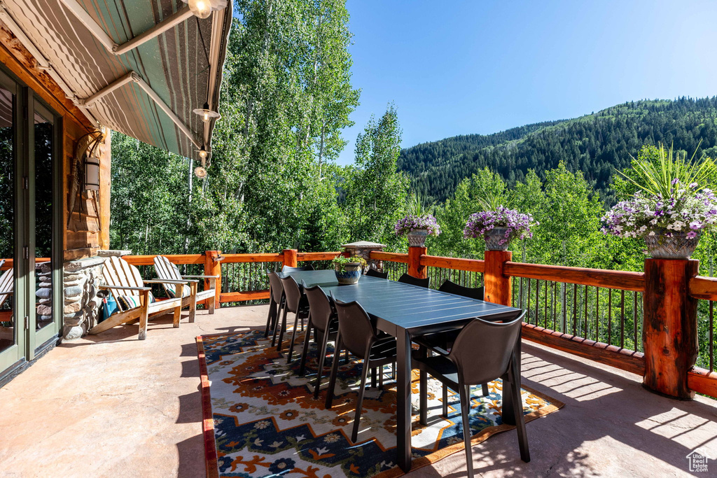 View of patio featuring a wooden deck