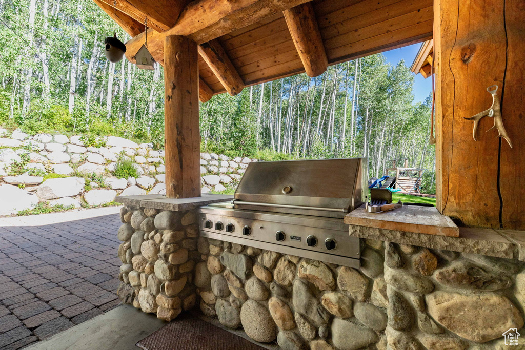View of patio featuring a grill and exterior kitchen