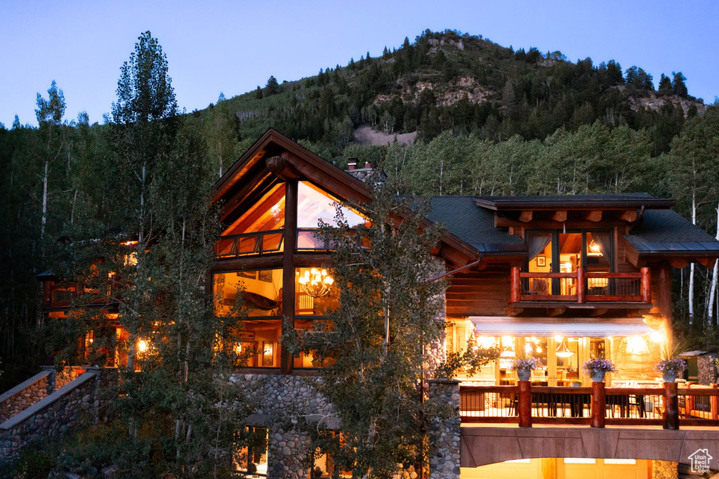 View of front facade with a balcony and a mountain view