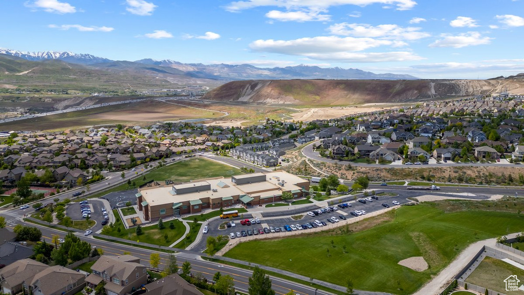 Aerial view featuring a water and mountain view