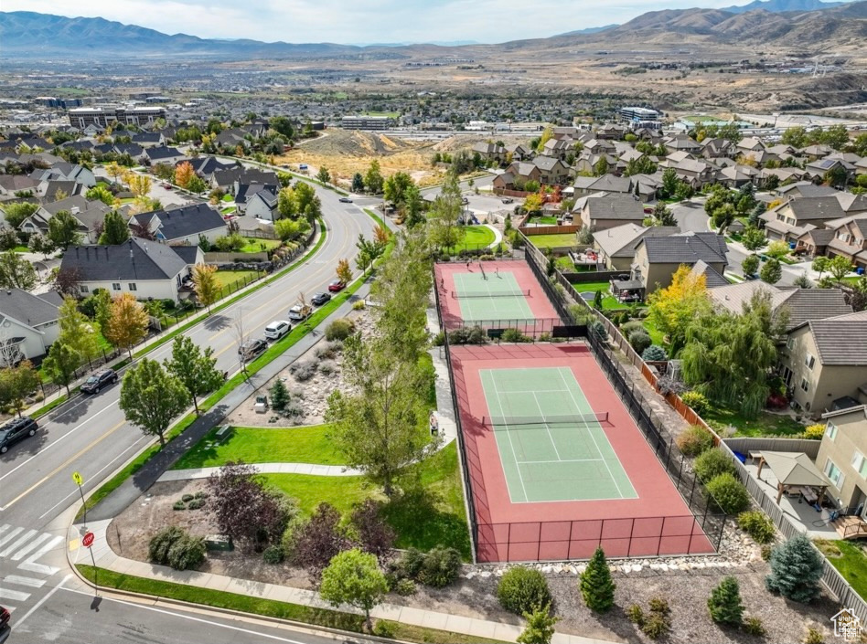 Birds eye view of property with a mountain view