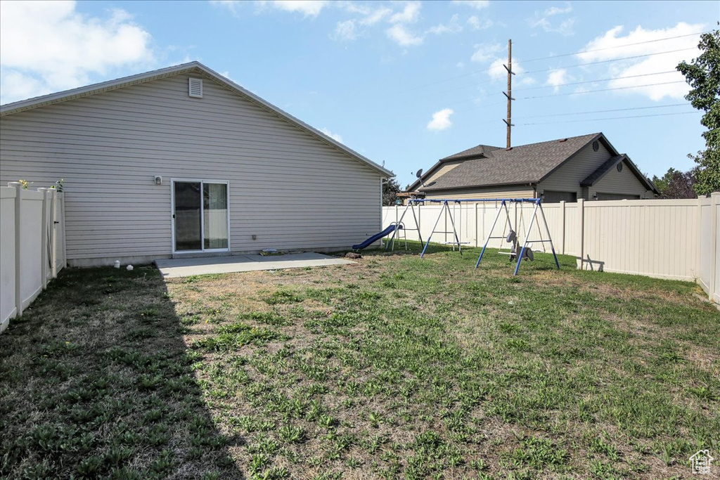 View of yard featuring a patio