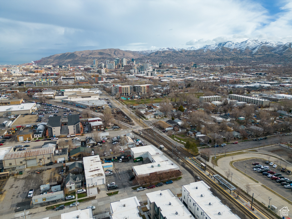 Birds eye view of property with a mountain view