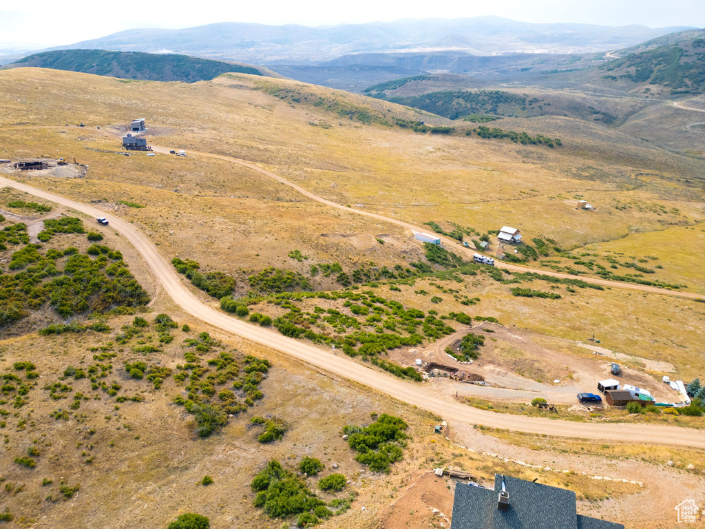 Birds eye view of property featuring a rural view and a mountain view