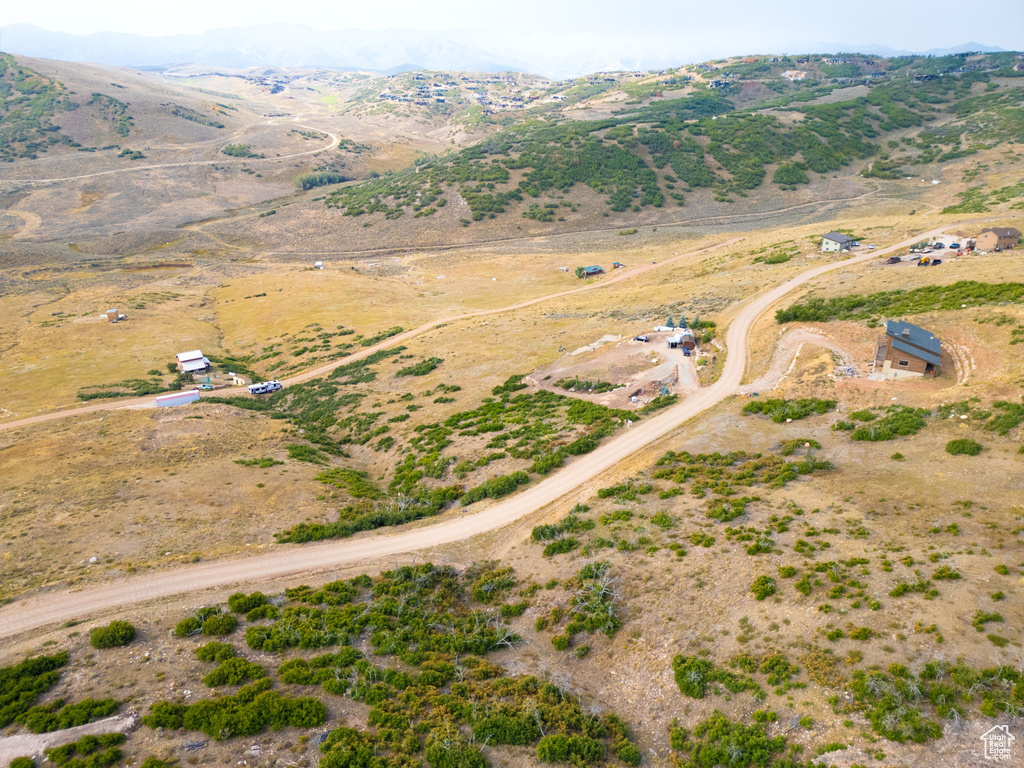 Drone / aerial view featuring a mountain view and a rural view