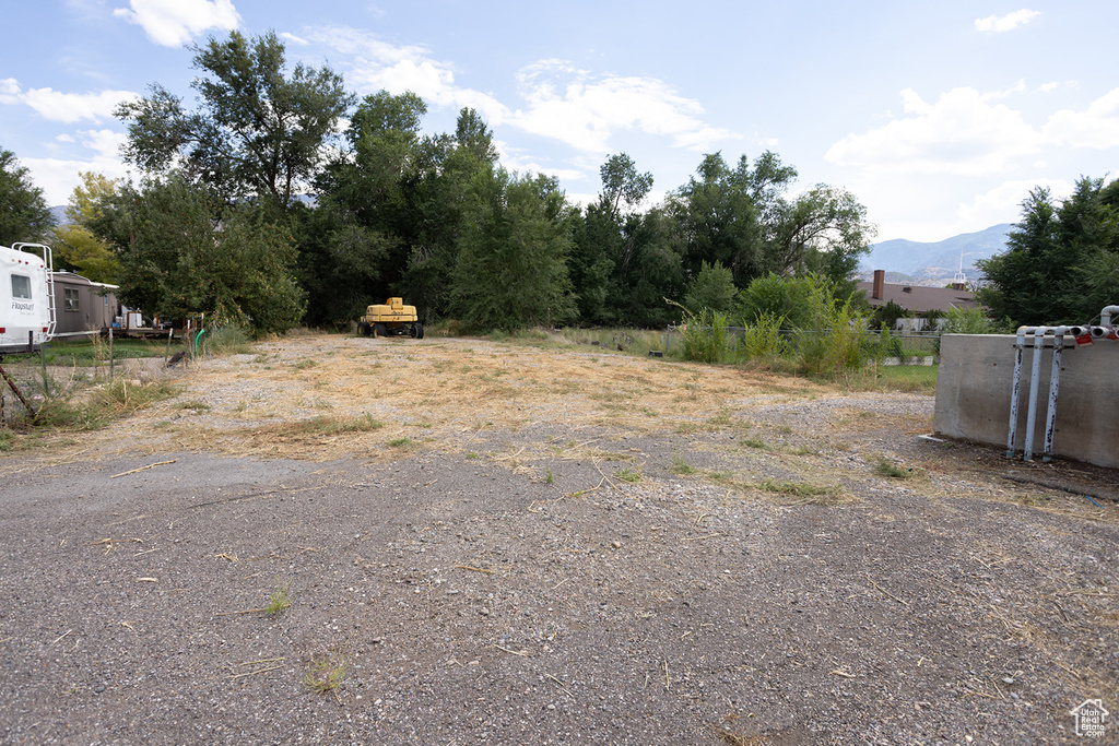 View of yard with a mountain view