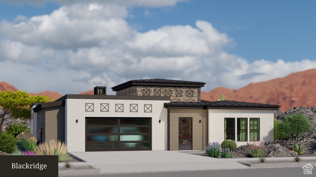 Exterior space featuring a mountain view and a garage