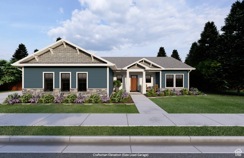 Craftsman inspired home with a front lawn