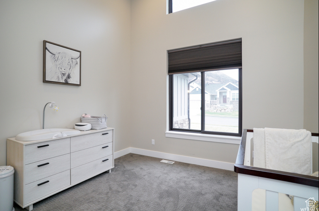 Bedroom with carpet flooring