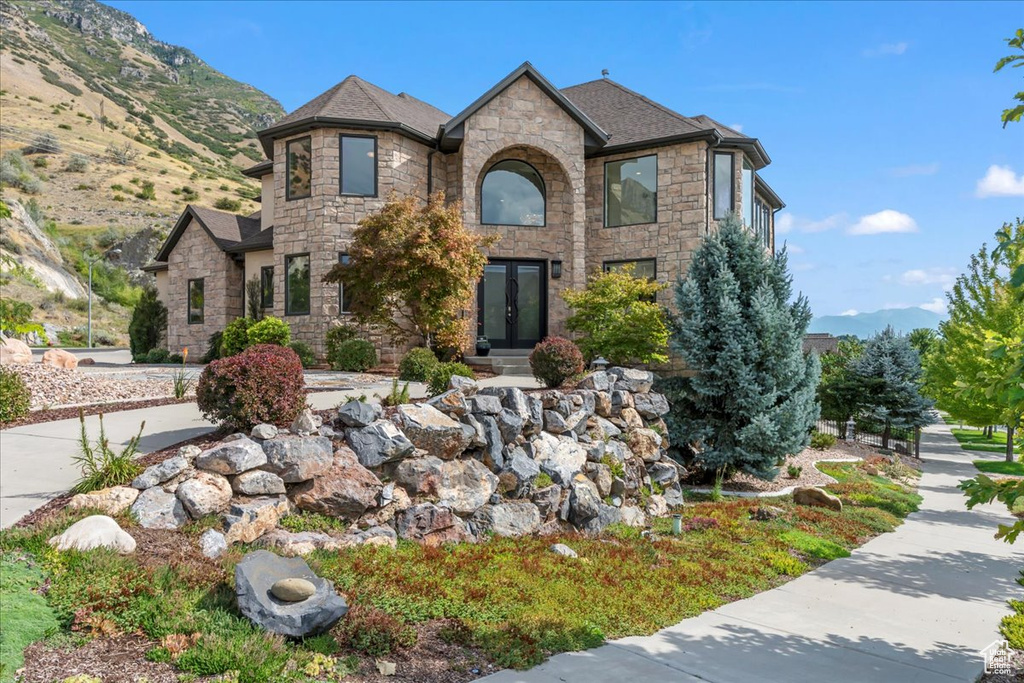 View of front of property featuring a mountain view