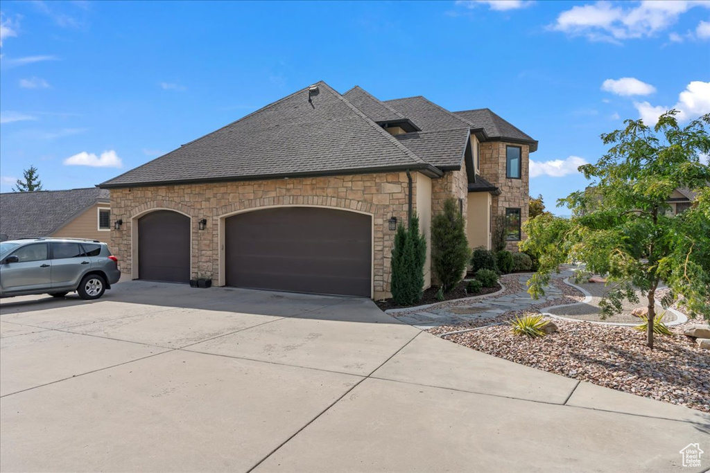 View of front facade with a garage