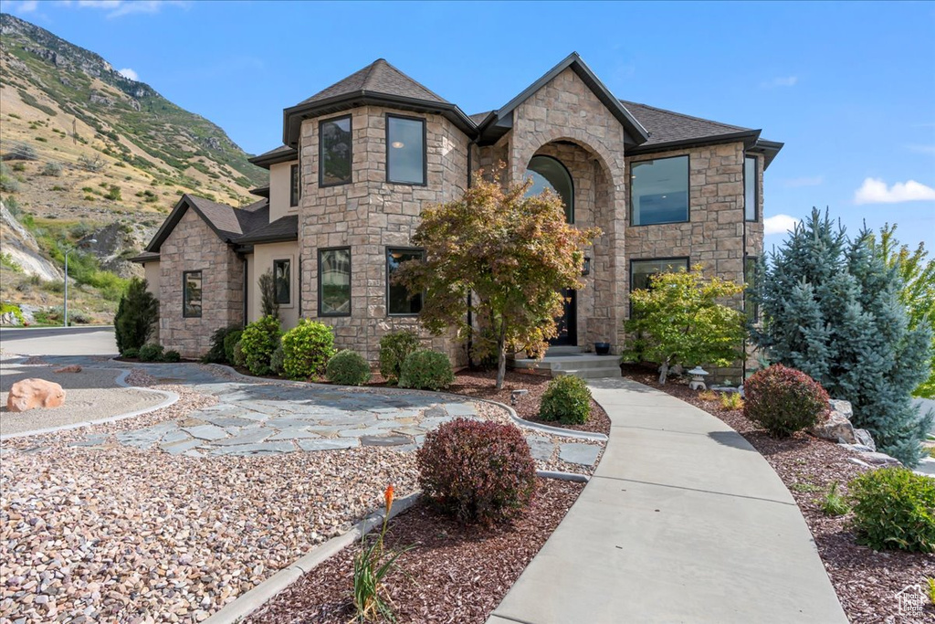 View of front of home with a mountain view