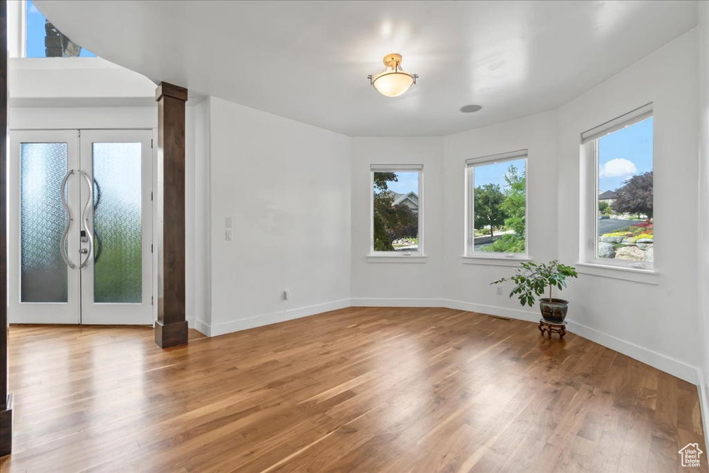 Spare room with hardwood / wood-style flooring