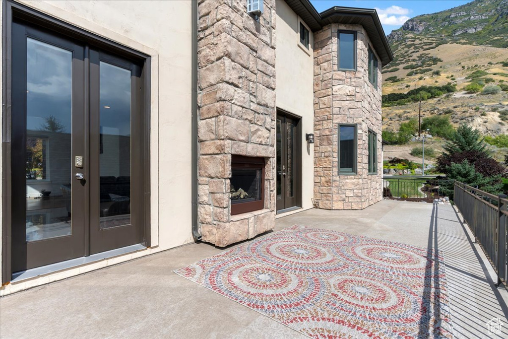 View of patio featuring a mountain view and french doors