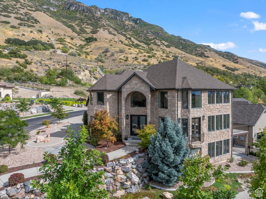 View of front of property featuring a mountain view