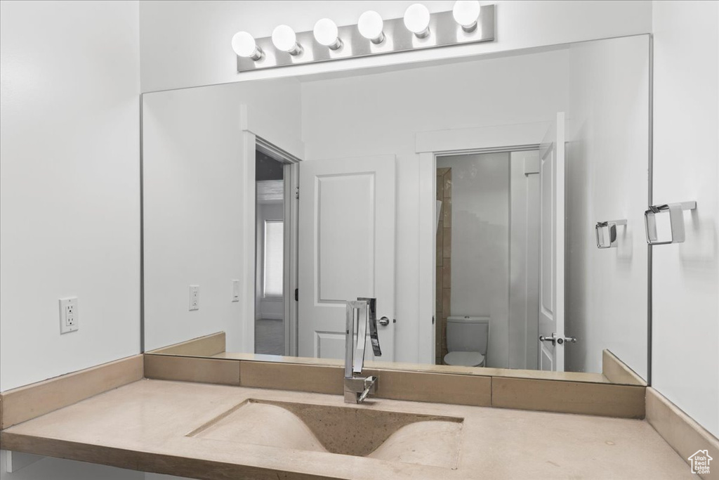 Bathroom with vanity and toilet