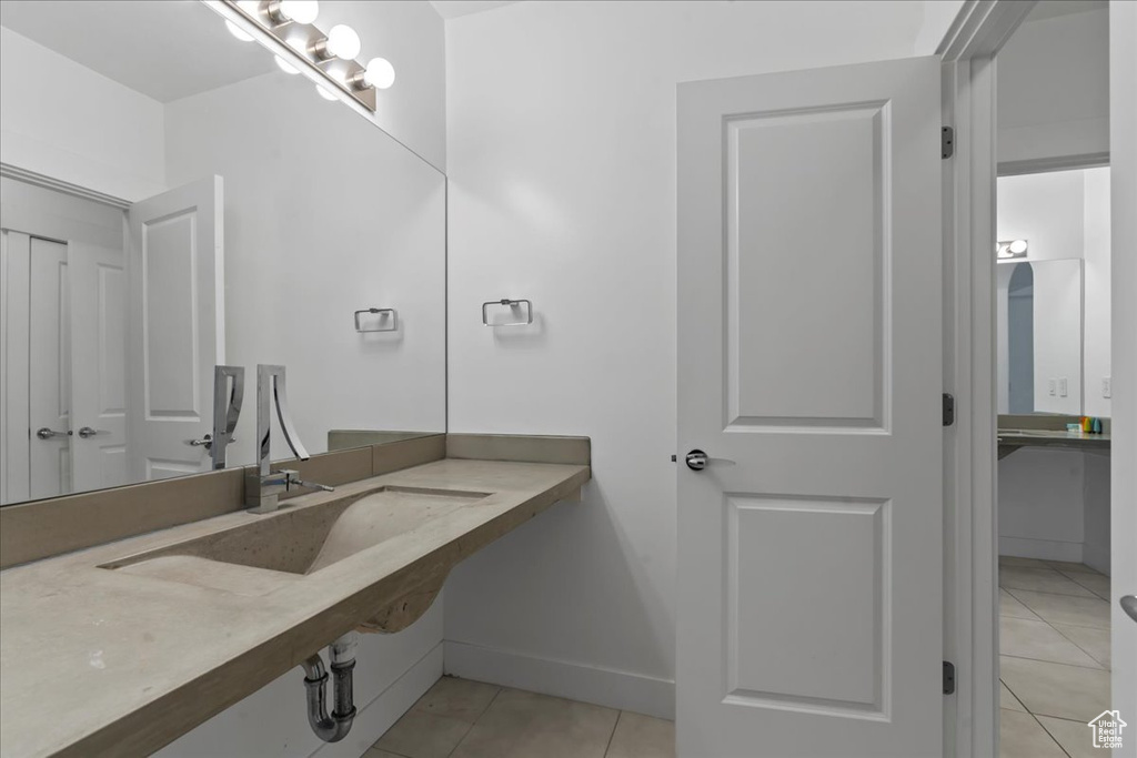 Bathroom featuring tile patterned floors