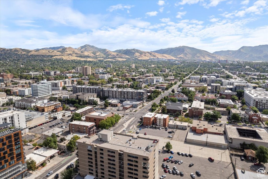 Birds eye view of property with a mountain view