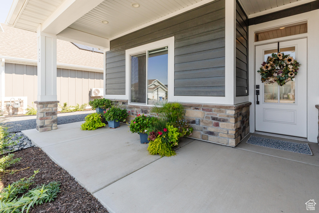 Entrance to property with covered porch