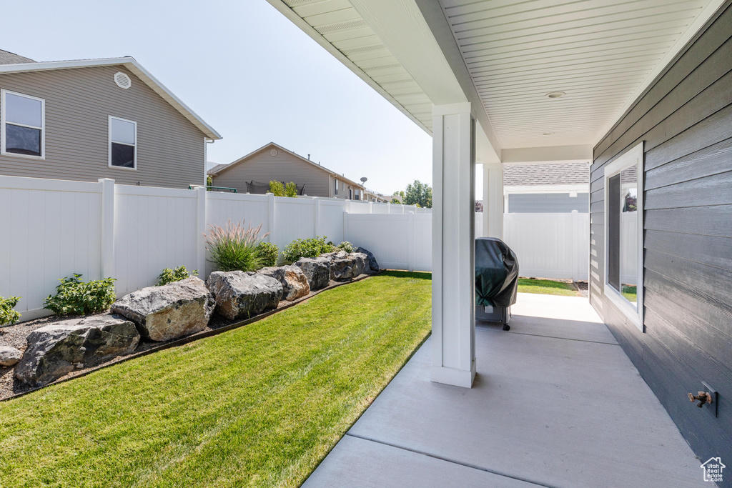 View of yard with a patio area