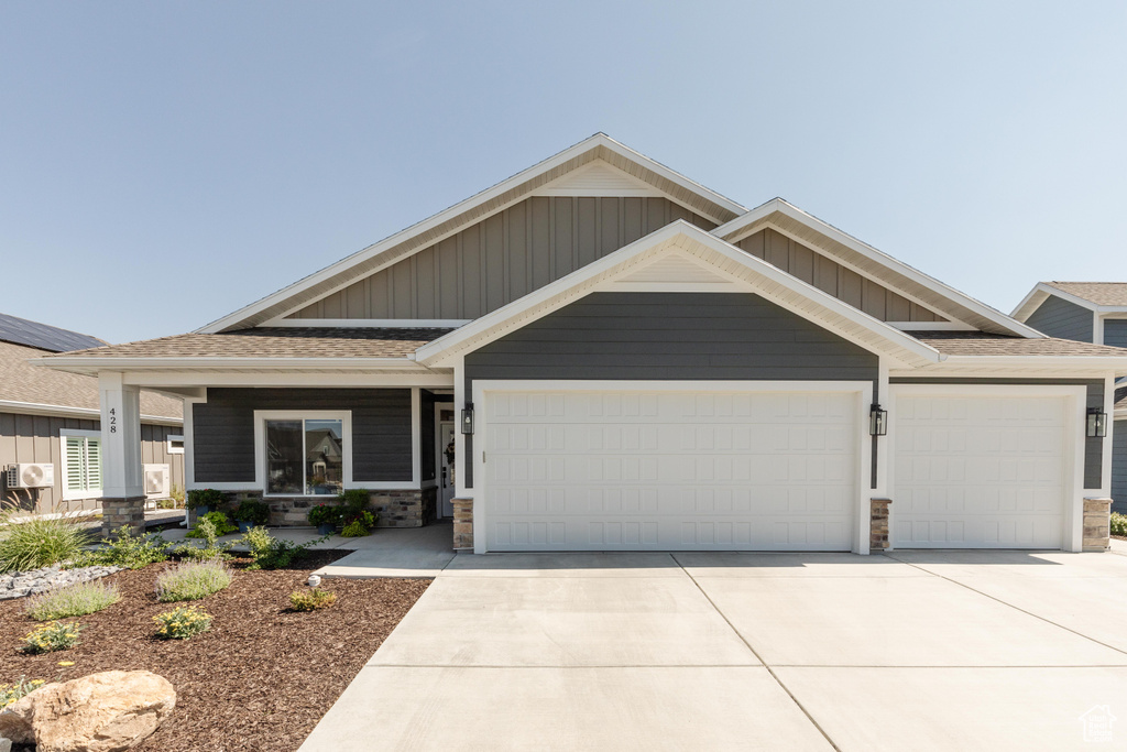 Craftsman inspired home with a garage