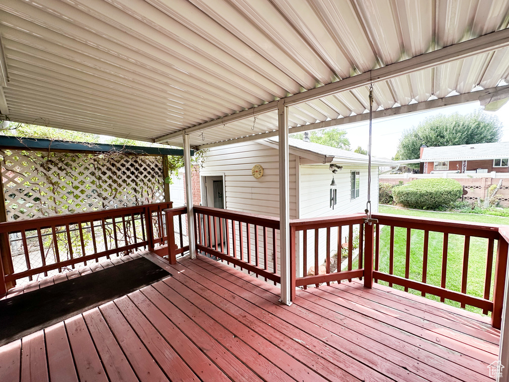 Deck featuring a yard