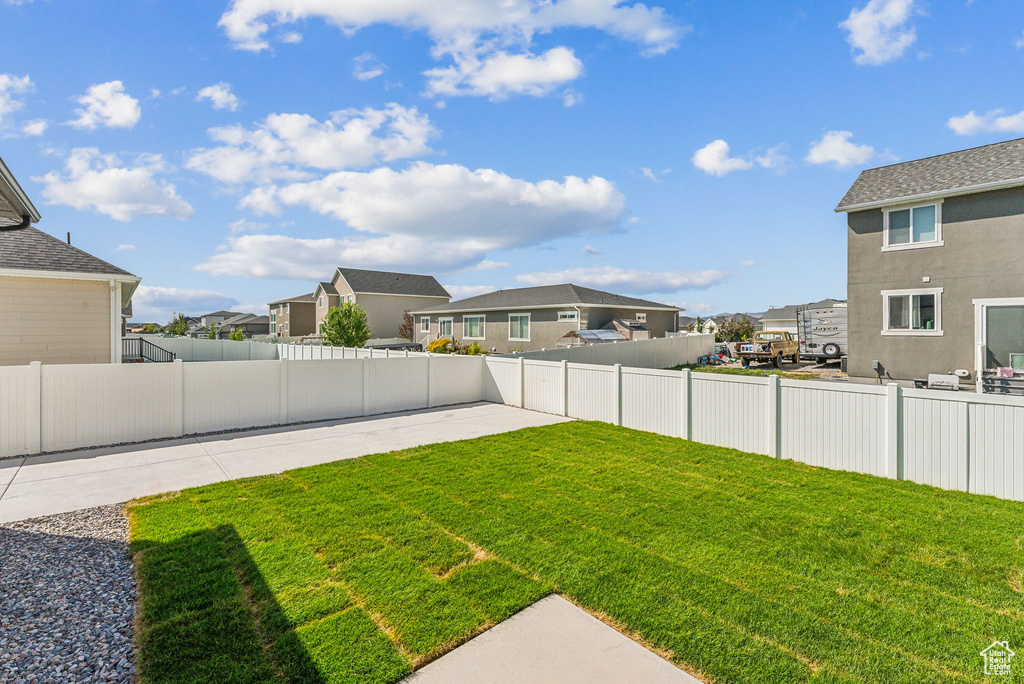 View of yard with a patio area