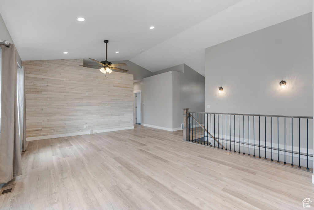 Interior space featuring vaulted ceiling, light hardwood / wood-style flooring, and ceiling fan