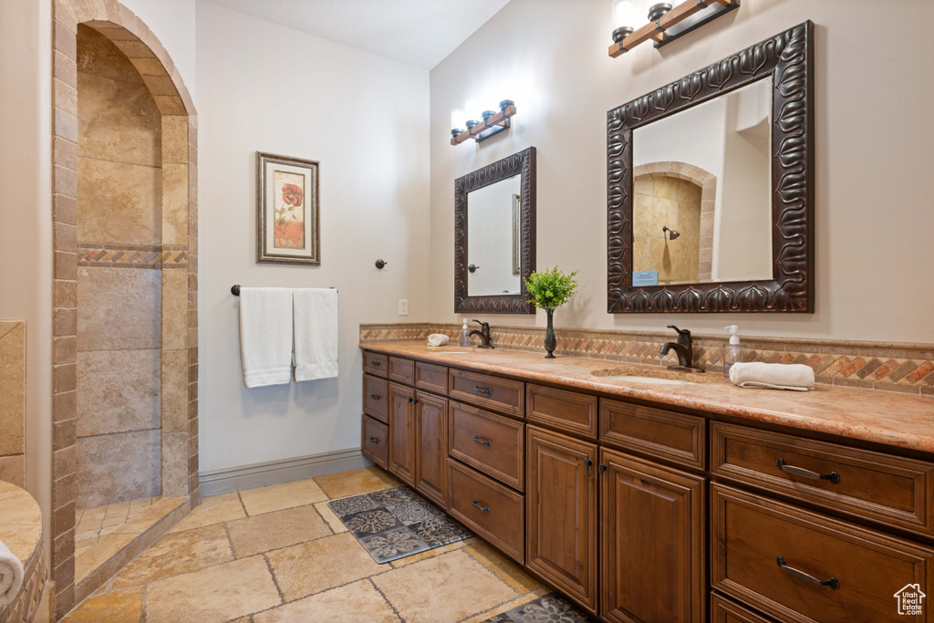 Bathroom with a shower and vanity