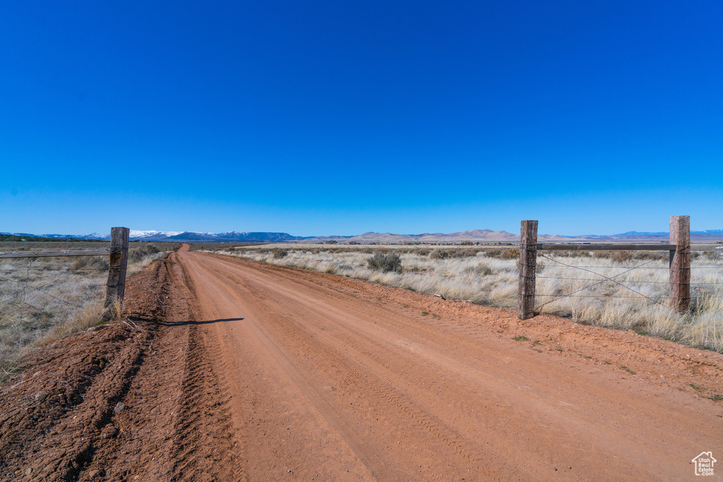 View of road featuring a rural view and a mountain view