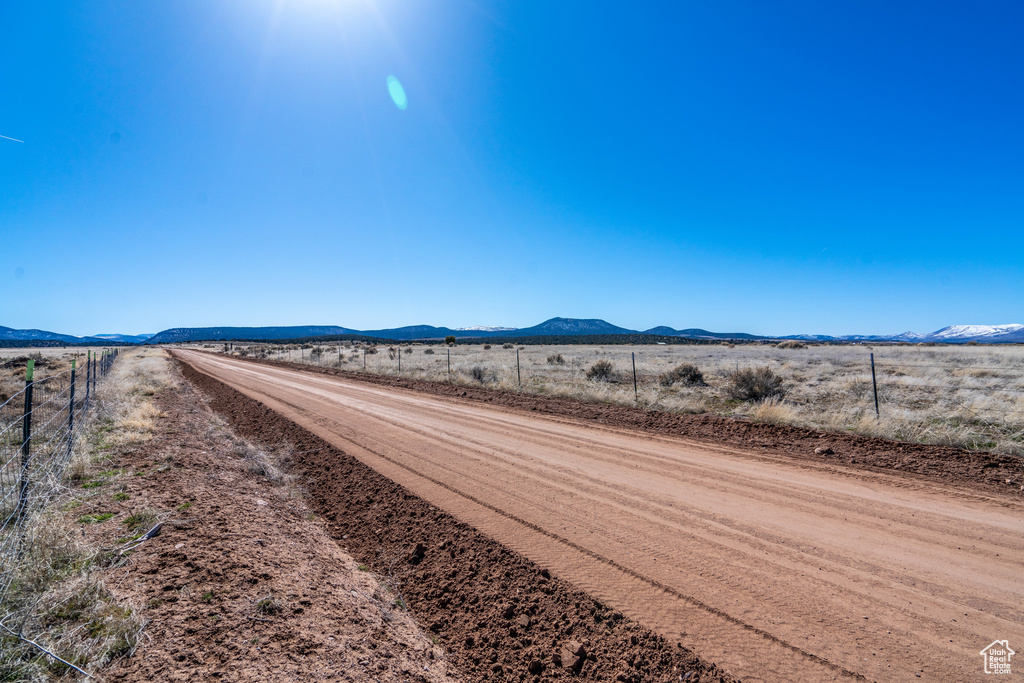 View of road featuring a mountain view and a rural view