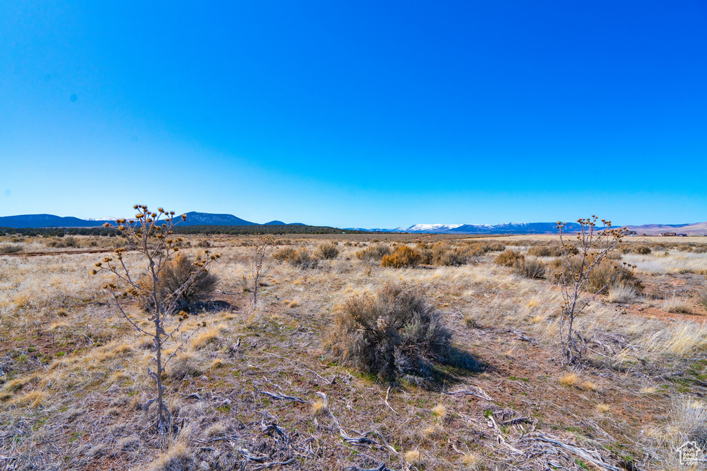 View of mountain feature with a rural view