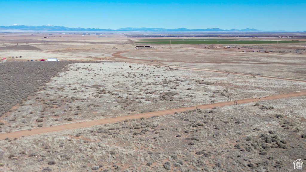 Birds eye view of property with a mountain view