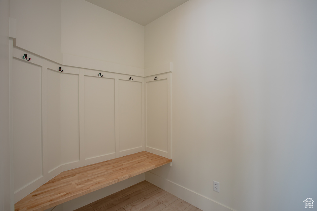 Mudroom featuring light wood-type flooring