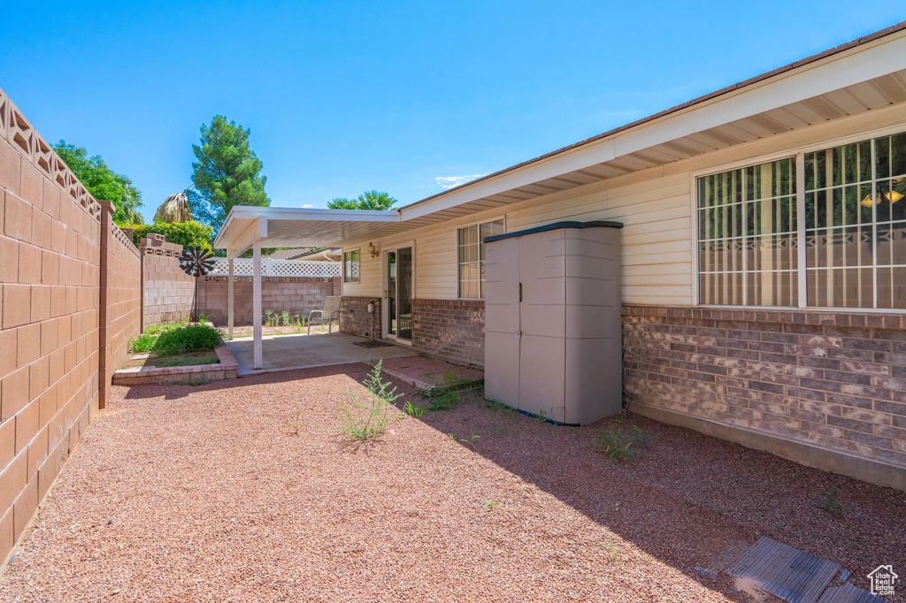 View of yard with a patio