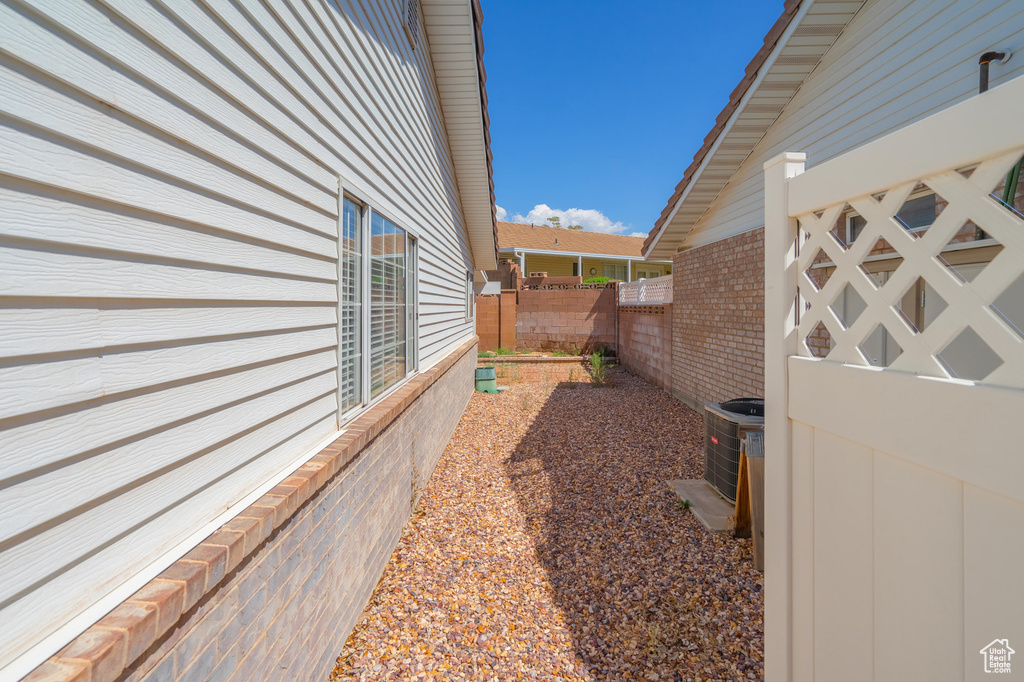 View of yard featuring central AC unit