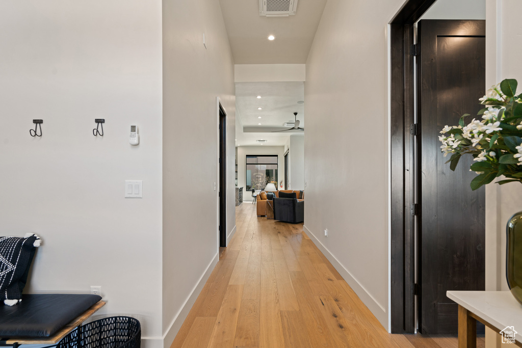 Corridor featuring light hardwood / wood-style floors