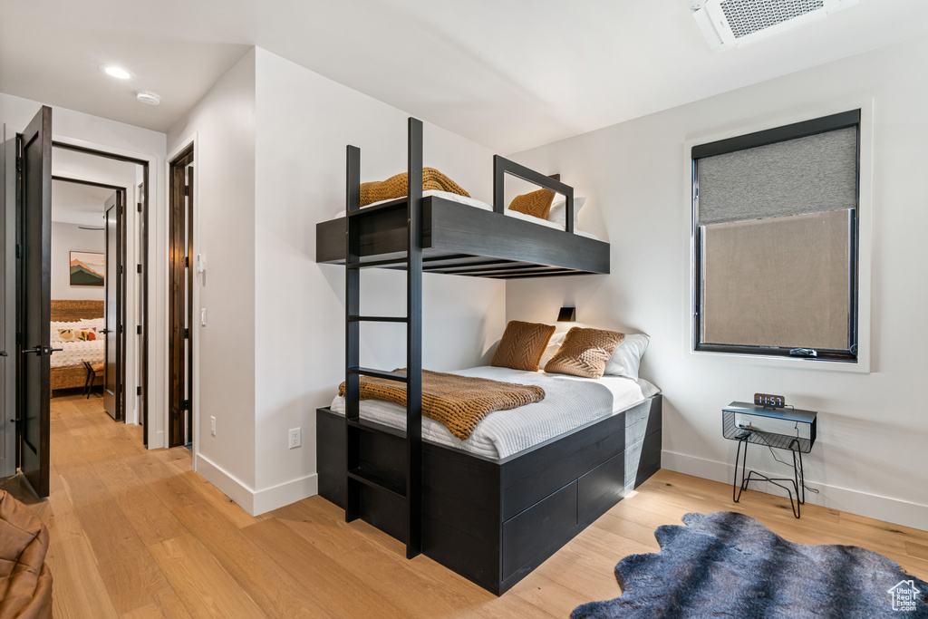 Bedroom featuring light wood-type flooring