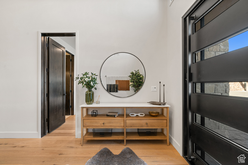 Corridor featuring light hardwood / wood-style floors