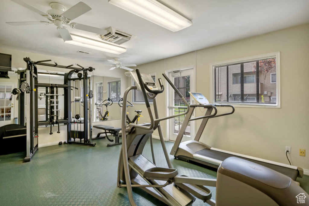 Exercise room featuring ceiling fan