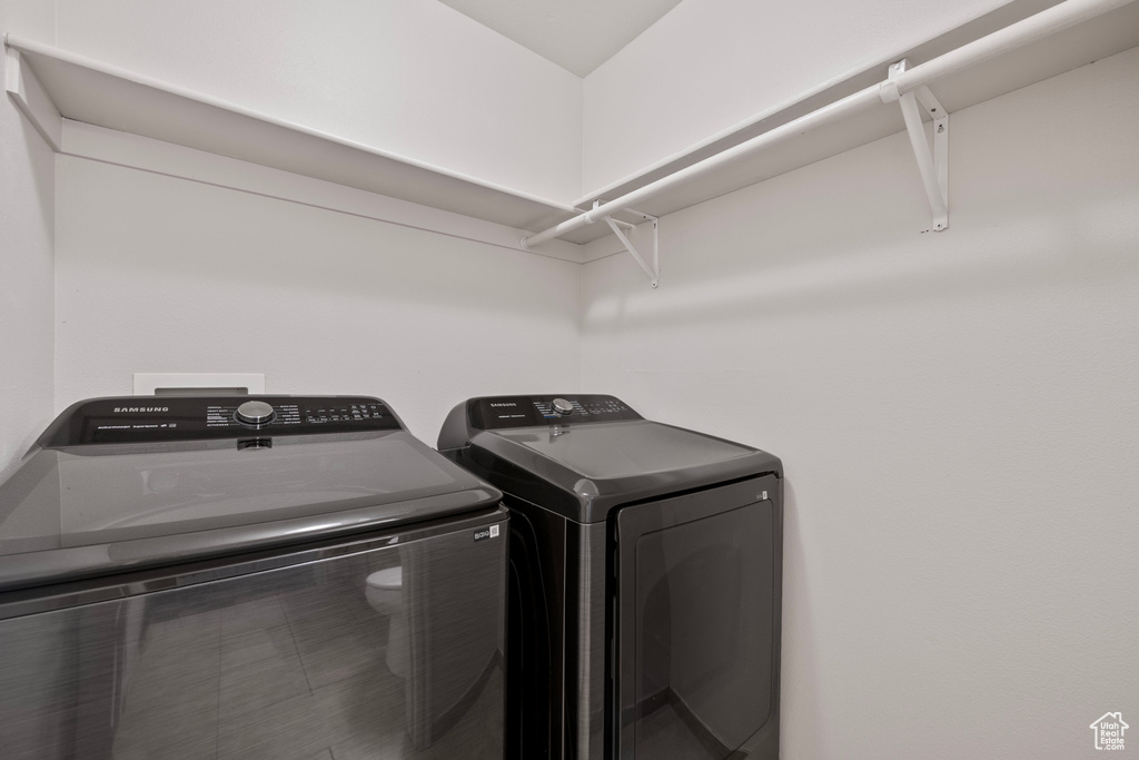 Laundry room featuring washing machine and dryer