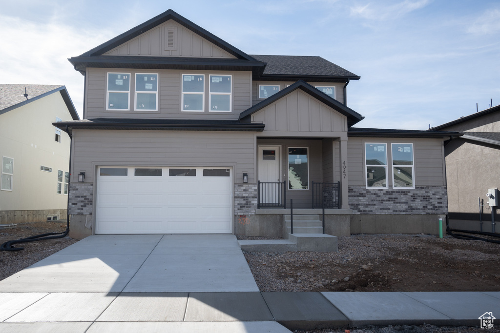 Craftsman-style home with a garage