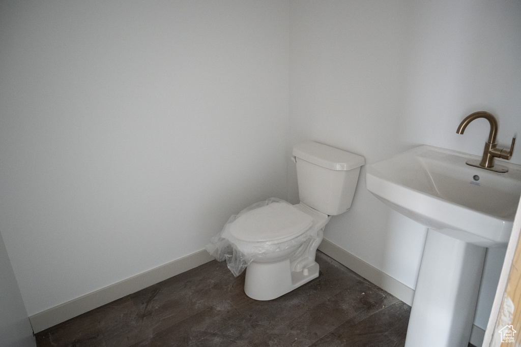 Bathroom with toilet and sink