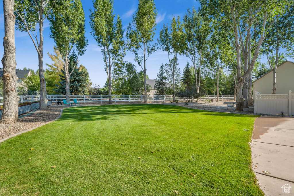 View of yard with fence