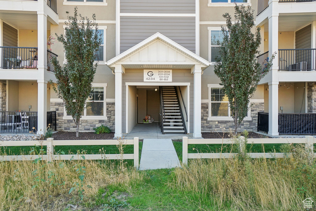 Exterior space featuring a balcony