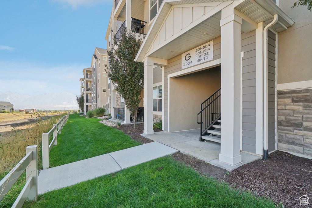 Exterior space with a mountain view and a balcony