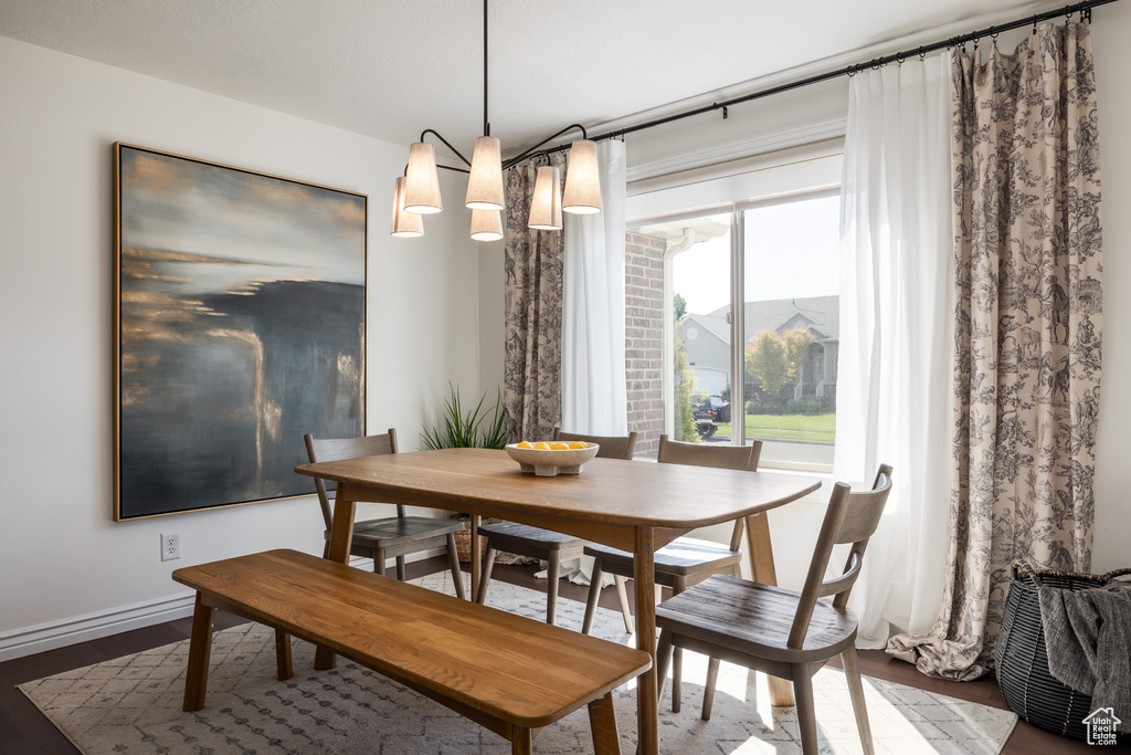 Dining area featuring hardwood / wood-style floors