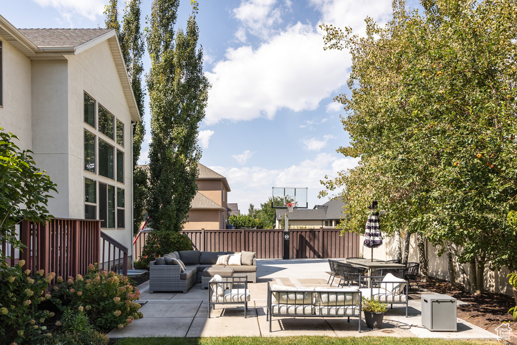 View of patio with an outdoor living space