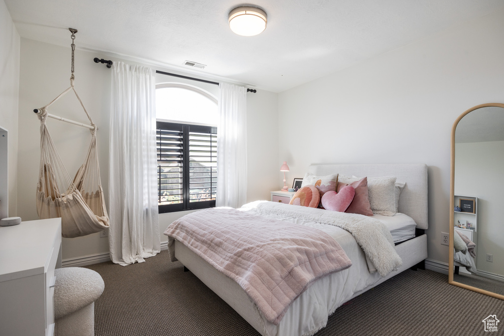 View of carpeted bedroom