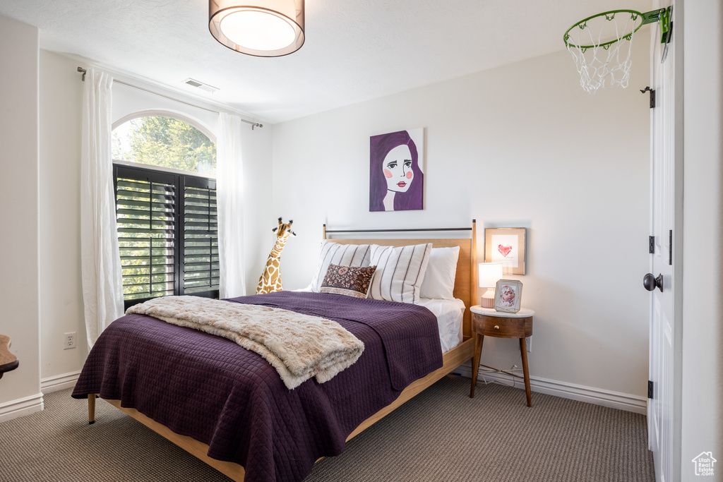 View of carpeted bedroom